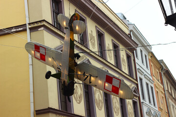 Closeup of a plane model on the street of Lublin Old Town, Poland