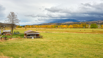 Rainy clouds above the countryside and mountains in Eastern Oregon.