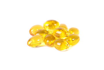 Vitamin D. Omega 3. Yellow pills slide isolated on white background. Vitamins are antibiotics. Cure for diseases. 
