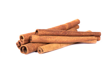 Dry cinnamon sticks on a white background. Cinnamon powder.
