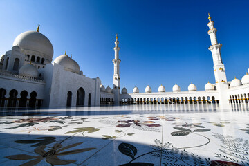 Side low angle shot of Sheikh Zayed Grand Mosque, Abu Dhabi, United Arab Emirates - Powered by Adobe