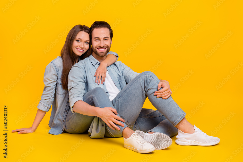 Sticker portrait of two attractive cheerful sweet people sitting hugging spending time isolated over bright 