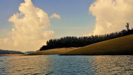 Beautiful view of Pykara Lake, Ooty, Tamilnadu during sunset. Awesome scenery of landscapes of...