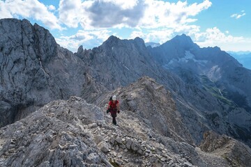 Climbing a via ferrata on the German Alps