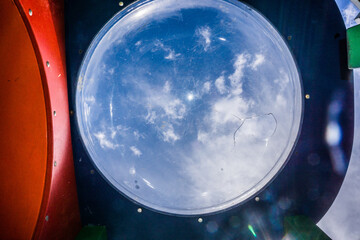 Clouds and blue sky from the airplane illuminator