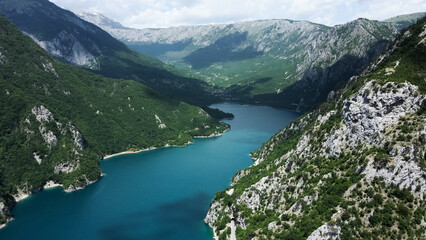 Aerial view of Pivsko lake. Beautiful blue water in Piva river, Montenegro