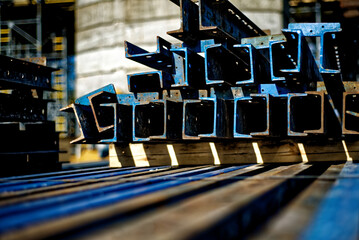 Closeup of rusted metal profile pipes of rectangular shaped cut in half