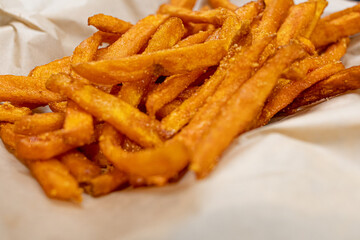 Closeup of the crispy salty deep-fried sweet potatoes