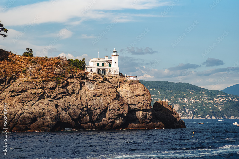 Poster The beautiful lighthouse of Portofino, built on a cliff