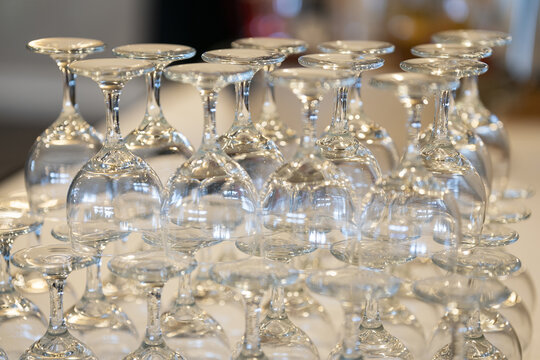 Selective Focus Shot Of Glasses Stacked Upside-down