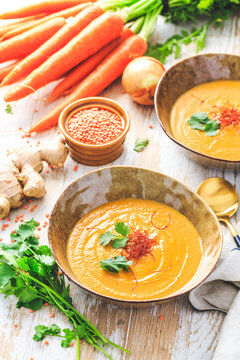 Homemade red lentil soup with carrots, ginger and coconut milk