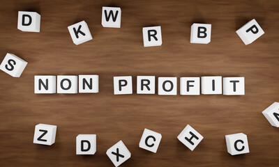 White dice with the word non profit on a wodden table. Charity, benefit, donation concepts. 3D illustration