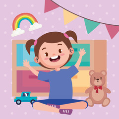 little girl playing with teddy