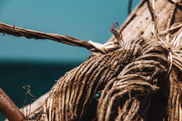 closeup shot of th a fisher's boat under a blue sky in Greece