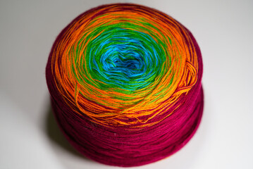 Top view of colorful wool ball with colors red, orange, green and blue. Photo taken May 1st, 2022, Zurich, Switzerland.