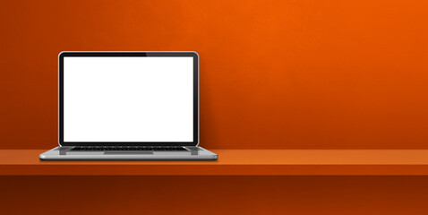 Laptop computer on orange shelf background banner