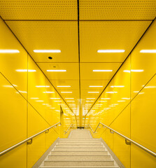 Yellow modern tunnel in Sendlinger Tor station © Raphael Paschalidis/Wirestock Creators