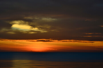 Naklejka na ściany i meble Sunset At The Beach, Tanjung Aru Beach, Kota Kinabalu, Borneo,Sabah, Malaysia