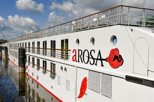 Koblenz, Germany - April 2022: Side view off a long river cruise ship operated by the arosa travel company
