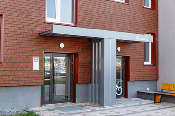Entrance to a modern multi-apartment residential building. concept of modern apartments