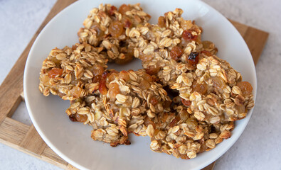 Ready-made banana-oatmeal cookies on a plate.