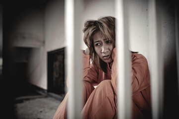 Hands of women desperate to catch the iron prison,prisoner concept,thailand people,Hope to be...
