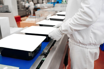 Production process, packaging on the conveyor line of meat in boxes.Conveyor Belt Food.Automated...