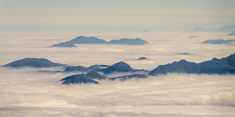 Mountain peaks above the  clouds. View from the Pic du Midi de Bigorre in the Pyrenees, France