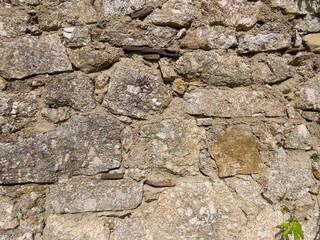 Mur de maison en pierres dans les Cévennes, Occitanie