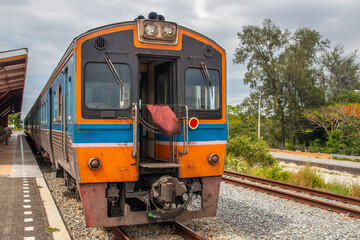 Fototapeta premium A train pulls into a station and waits for passengers
