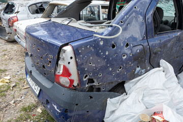 War of Russia against Ukraine. Civilian cars shot.