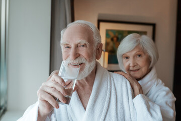 A happy elderly couple feeling good together