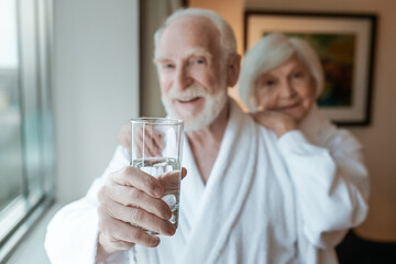 A happy elderly couple feeling good together