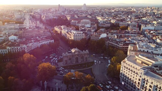 Drone footage of the Puerta de Alcala with panorama of Madrid in the background