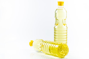 a bottle of vegetable oil on a white background,Oil in plastic bottles. Two bottles isolated on...
