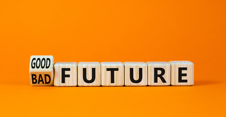 Good or bad future symbol. Turned wooden cubes and changed concept words Bad future to Good future. Beautiful orange table orange background, copy space. Business bad or good future concept.