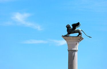 column with statue of Winged Lion in Venice Island in Italy in Europe