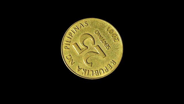 Rotating obverse of Philippines coin 25 sentimo 2001. Isolated in black background.