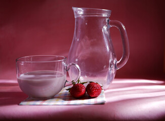 Strawberry milkshake on pink background medium shot 