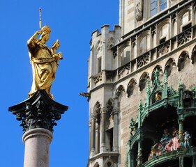 Golden Statue of Holy Mary in the Marienplatz in Munich in Germany