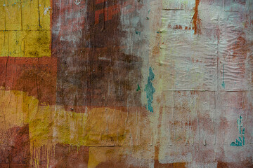 Colorful Torn Ripped Paper Poster Street Wall Surface. Grunge Rough Dirty Rust Background. Urban...