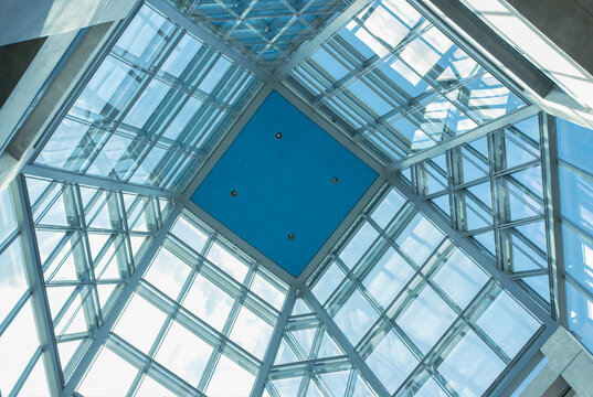 Interior example of the use of extruded aluminum mullions and double glazing in an institutional atrium application, daytime, nobody