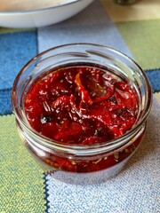 Homemade sun dried tomatoes in olive oil and glass jar