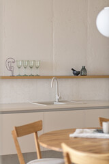 modern beige kitchen interior with kitchen accessories, loft style kitchen interior, close-up on a kitchen