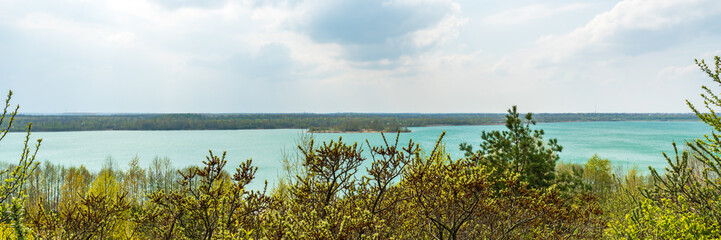 Panoramic view at the Markkleeberger lake near Leipzig in early spring