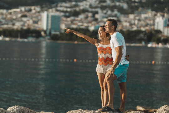 Couple Enjoying A Summer Vacation At The Mediterranean Coast