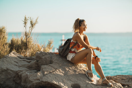 Woman Enjoying A Summer Vacation On A Mediterranean Coast
