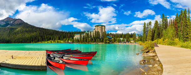 Canoes on Lake Louise, Banff National Park, Canada - obrazy, fototapety, plakaty