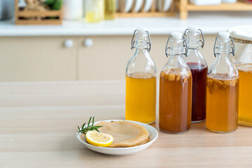 Kombucha superfood probiotic beverage in glass. Natural kombucha fermented tea beverage healthy organic drink in glass.