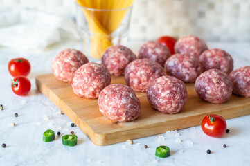Mincemeat, uncooked Meatball on a table